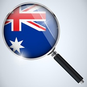 Magnifying glass over an Australian Flag